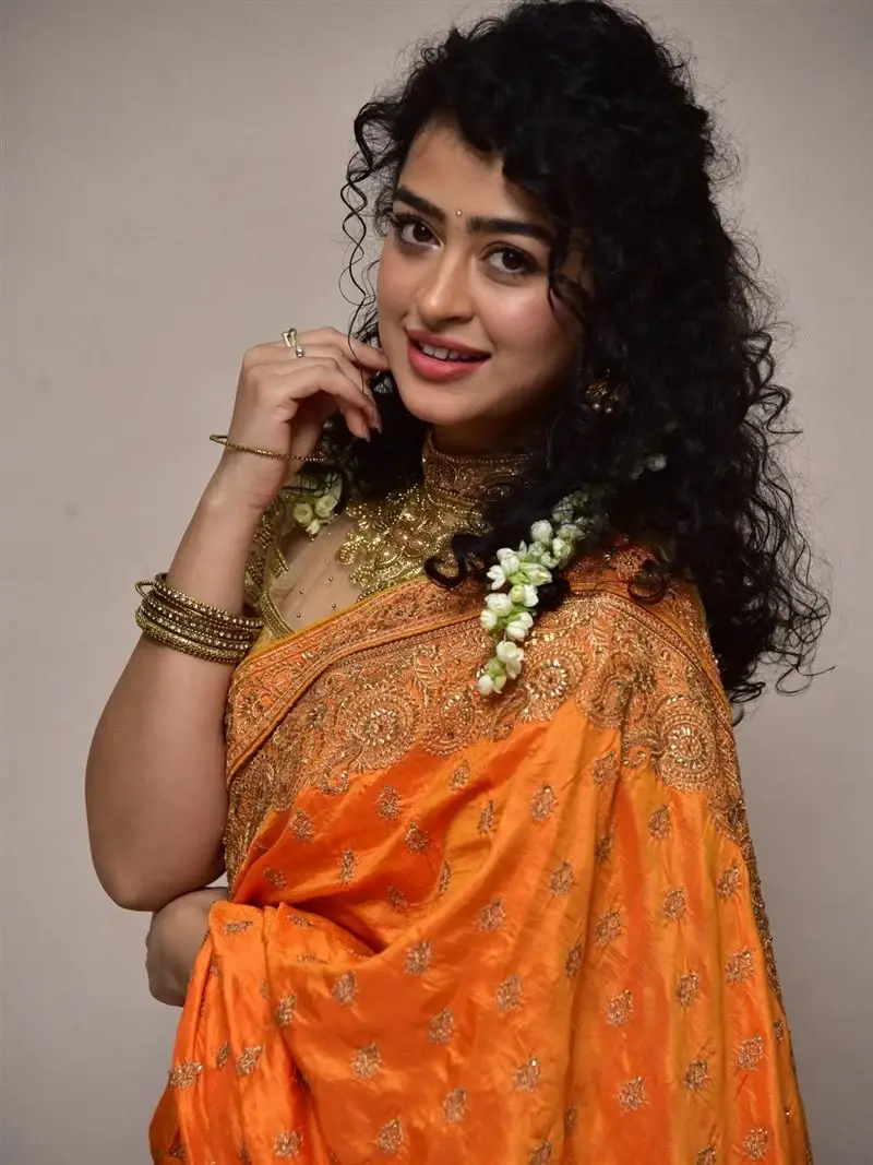 Actress Apsara Rani in Orange Saree at Talakona Movie Launch